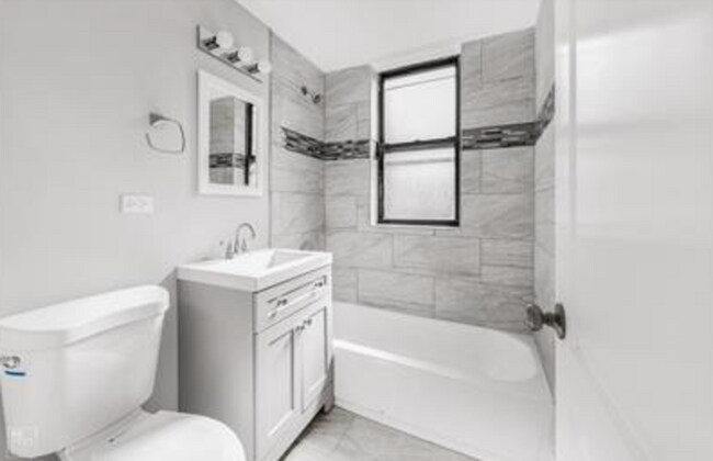 Building Photo - 7113 South Bennett Avenue - 7113-2B