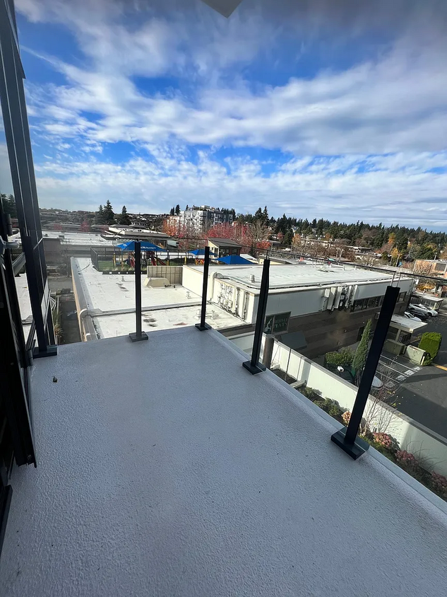 Enjoy the PNW views from your private balcony - 889 103rd Ave NE