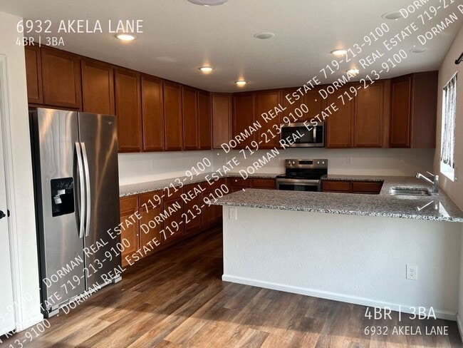 Foto del edificio - 6932 Akela Ln