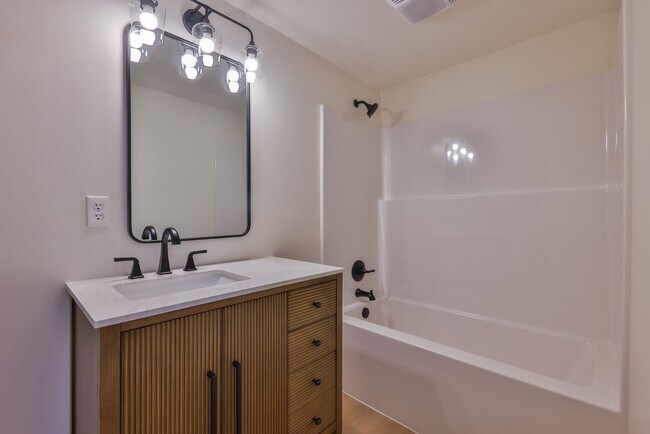 Building Photo - Modern Remodel with Designer Finishes | All Utilities Included