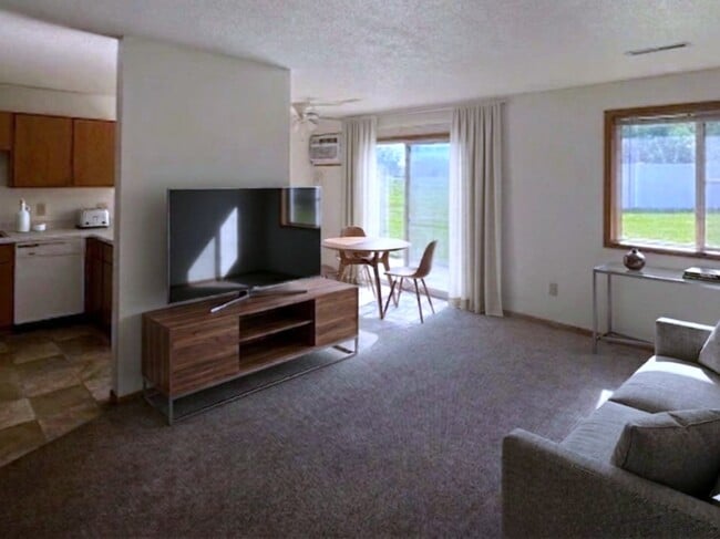 Sala de estar, alfombra - Valleyside Townhomes