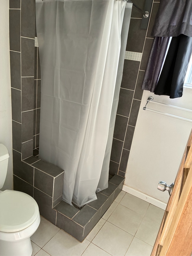 Bathroom/shower w/plenty of storage cabinets. - 3580 Colonial Ave