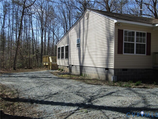 Foto del edificio - 5705 Community House Rd