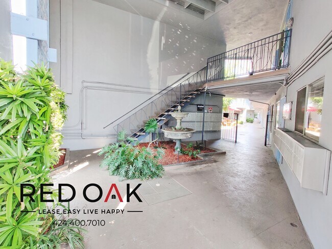 Foto del edificio - Bright and Welcoming Top Floor Two Bedroom...
