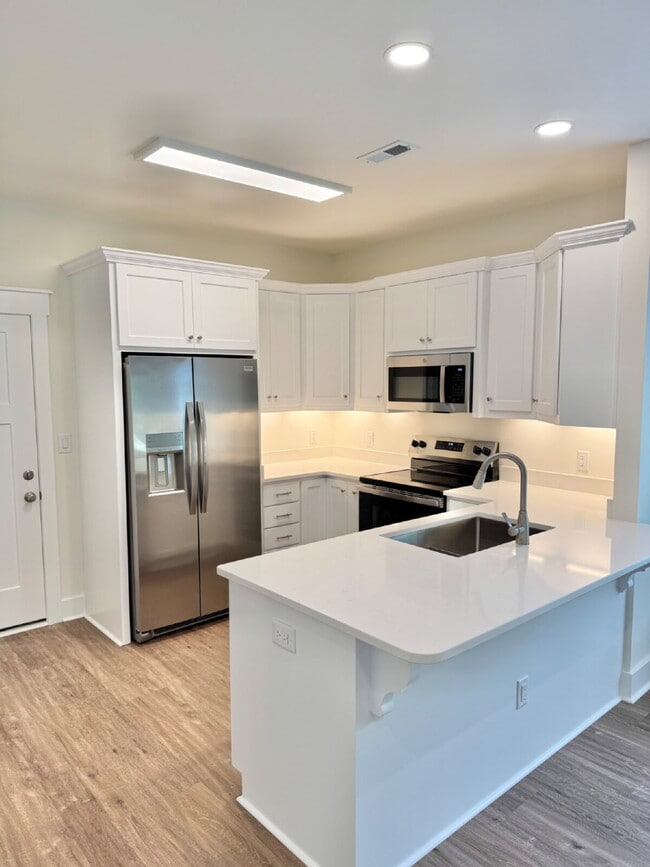 Building Photo - Low Maintenance Lifestyle! GORGEOUS 2 BR | 2 BA Brick Duplex in Rosewood (Goldsboro) *Lawn Care/T...