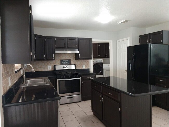 Foto del edificio - 8308 Peekskill Ln