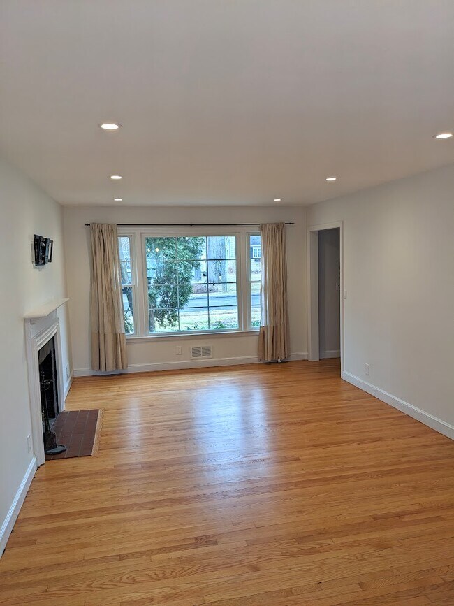 Large custom picture window fills the living space with light - 166 Arundel Ave