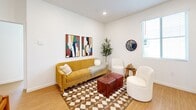 Located at 15912 Chase Rd in Fontana, CA, this well-appointed single-story home offers a thoughtful layout with one bedroom, two full bathrooms, and a dedicated office — making it as functional as it is comfortable. Light wood flooring flows consistently throughout, complementing the clean white walls and recessed lighting that give the space a bright, modern feel.

The open-concept living room is a welcoming gathering area, featuring large windows with slatted blinds that invite natural light. The kitchen is efficiently designed with white shaker cabinetry, white quartz countertops, a stainless steel refrigerator, dishwasher, and range, plus a window above the sink that keeps the space feeling airy.

The bedroom offers a cozy retreat with a built-in closet, natural light from dual windows, and a serene ambiance. The dedicated office is a standout feature, with corner windows on two walls that fill the room with abundant natural light — ideal for focused work or creative pursuits.

Both bathrooms are finished in a clean, contemporary style with white vanities and wood-look flooring. One features a walk-in glass shower, while the other includes a shower-tub combo. Every room reflects a cohesive, modern design sensibility that maximizes comfort within a compact, efficient footprint.