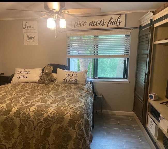 Master bedroom with walk in closet and built in - 109 Cedar Ridge Way