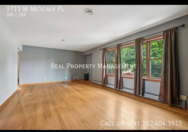 Building Photo - 9711 W Metcalf Pl