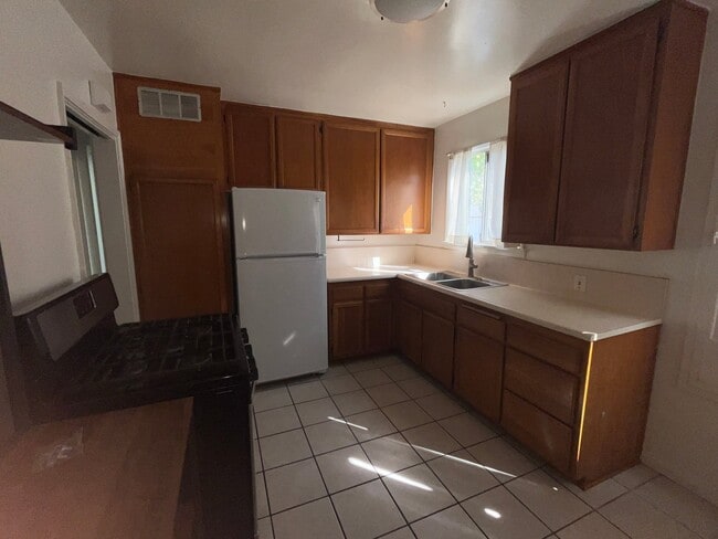 Photo - 5618 Kinston Ave Apartment
