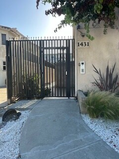 Newly Installed Security Gate from Outside - 1431 S Bedford St