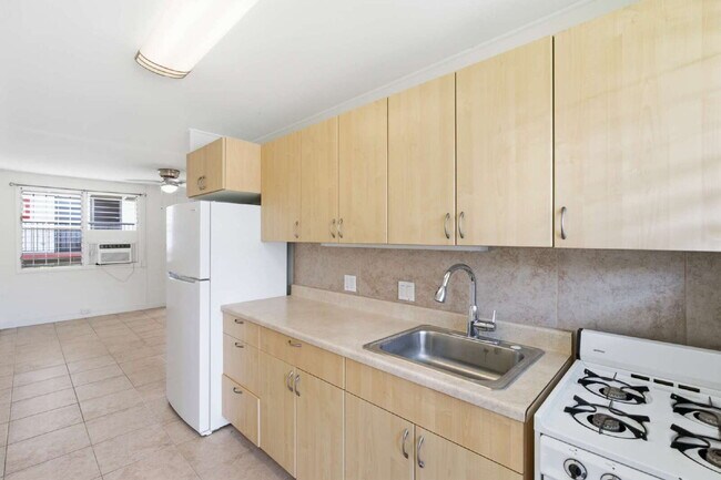 Foto del edificio - Charming 2-Bedroom Apartment in Prime Ala Moana Location – Parking & In-Unit Washer/Dryer!