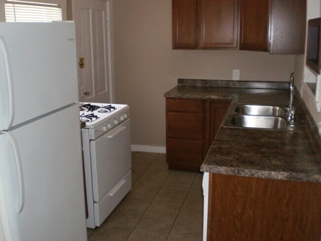 Kitchen with appliances - 1080 26th St