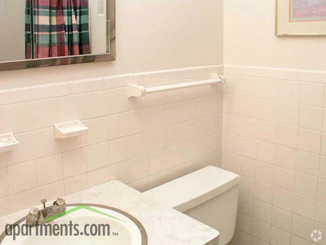 First Bathroom - Fine Living at Aquila Park & Royal Park