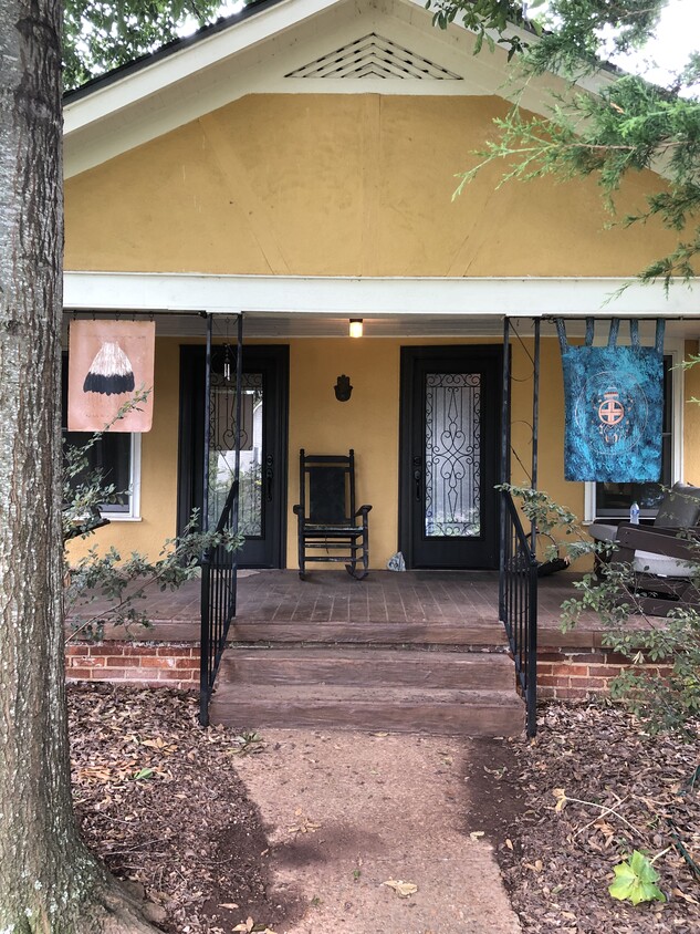 This is a 1300 square-foot house with two front doors. - 1006 Oshaughnessy Ave NE