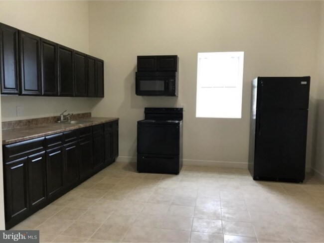 Foto del edificio - 310-312 W Main St