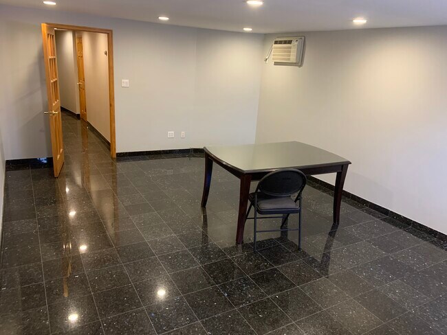 Room Downstairs - 6104 Flushing Ave