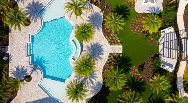 Piscina con estilo de centro turístico - Integra Palms