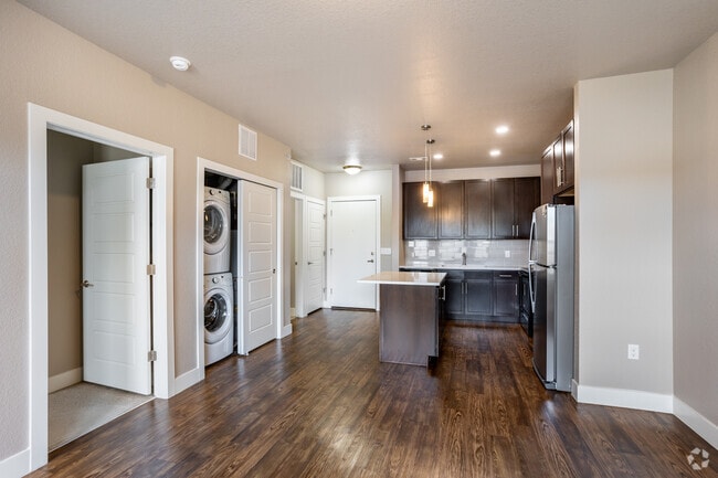 Jade - Living Room / Kitchen - Basecamp at West 8th Apartments