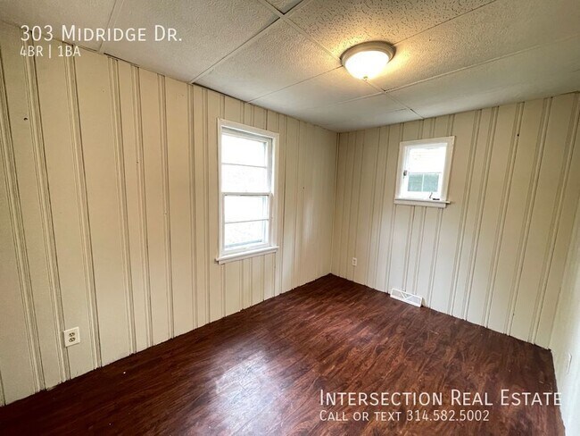 Foto del edificio - 303 Midridge Dr