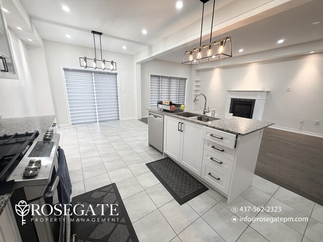 Building Photo - Spacious 4-Bedroom + Den Upper-Level Apartment with Garage & Backyard in Brampton