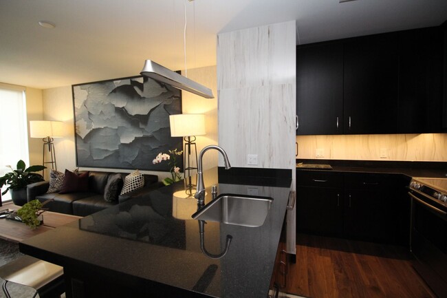 Building Photo - Upscale Designer-Furnished Condo for Rent