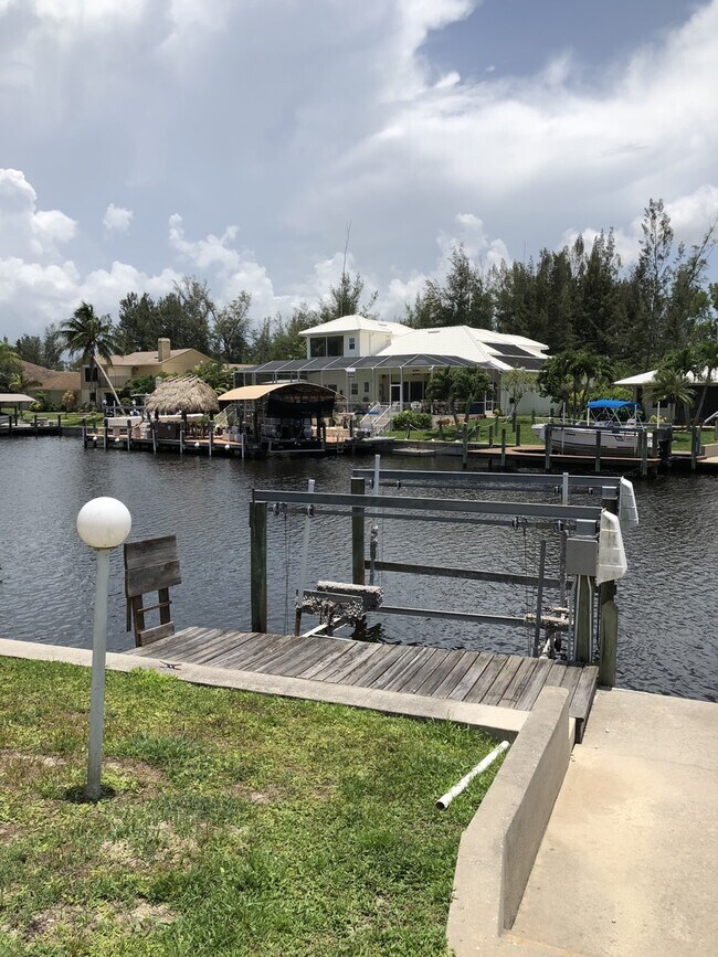 Building Photo - Gulf access Pet Friendly Pool home in SW C...