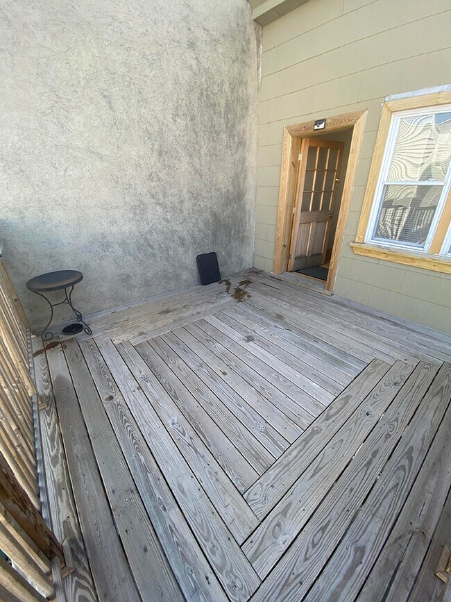 deck looking back at door - 100 Reservoir Ave