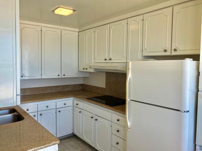 Updated Kitchen w Refrigerator and Dishwasher - 2999 E Ocean Blvd
