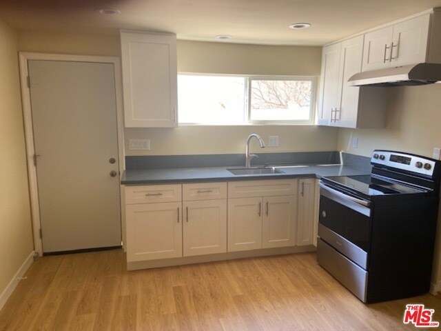 Foto del edificio - 5137-5137 1/2 Reynier Ave
