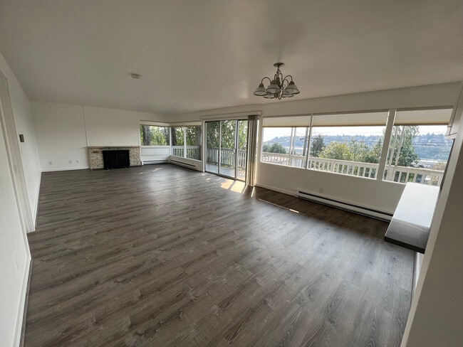 New Luxury Vinyl Plank flooring, paint, window treatments, bathroom hardware and vanity/toilet. - 2220 12th Ave W