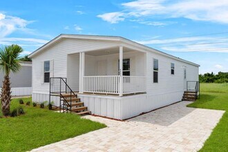 Building Photo - 6681 Hidden Oaks Dr