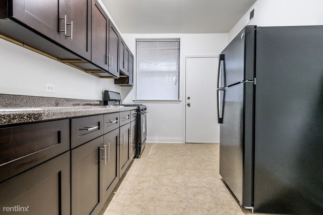 Building Photo - 4 br, 2 bath Apartment - 5046 S Champlain Ave