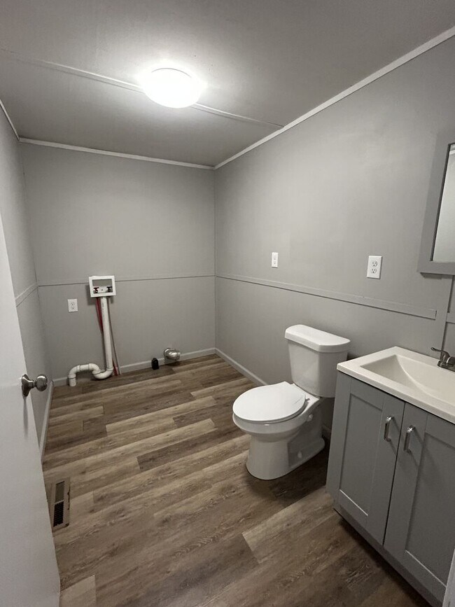 Building Photo - PRICE DROP!  NEWLY Remodeled Nice 3 bedroom 1.5 bath HUGE Fenced in back yard.