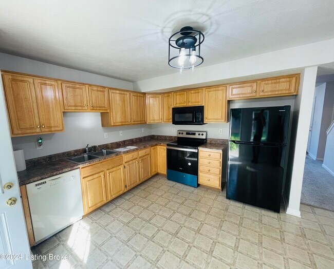 Foto del edificio - 5911 Woodcreek Crossing Way