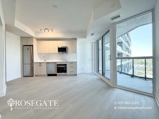 Photo du bâtiment - 1-Bedroom + Den Condo with 2 Bathrooms, Parking, Locker & Rogers Internet – Scarborough