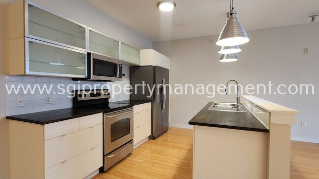 Building Photo - 1111 S Akard St