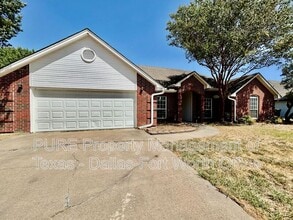 Building Photo - 7724 Sagebrush Ct N
