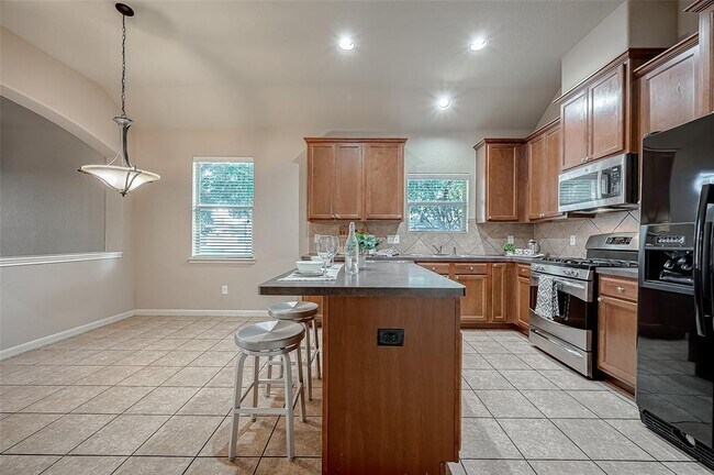 Foto del edificio - 6151 Grassy Haven Ln