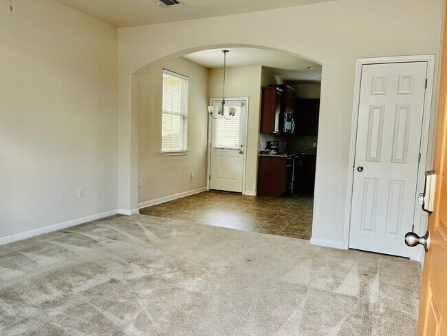 Living room, dining room, kitchen - 5424 Falling Leaf Ln