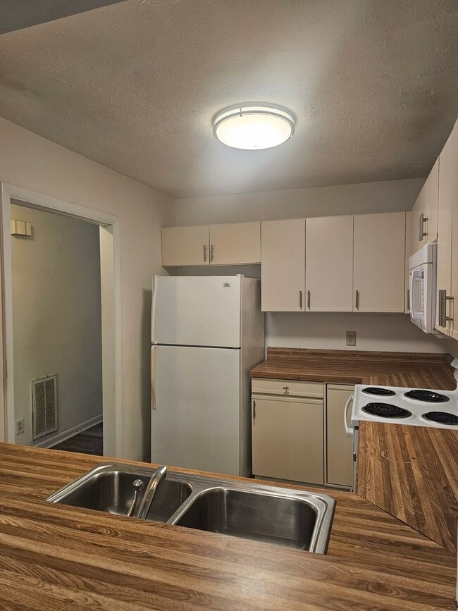 Building Photo - NEW LISTING- Coming Soon- Townhome with 2 ...