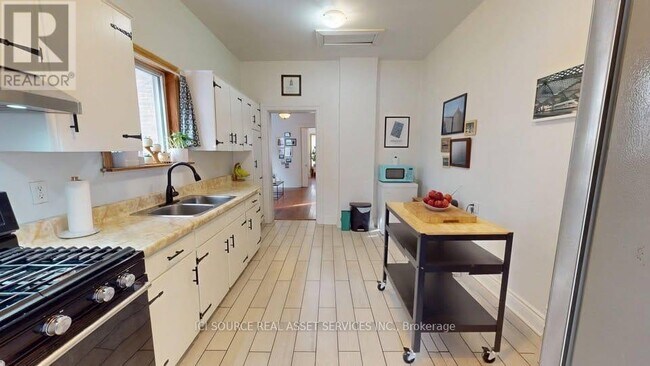 Photo du bâtiment - 132 Ferguson Ave N