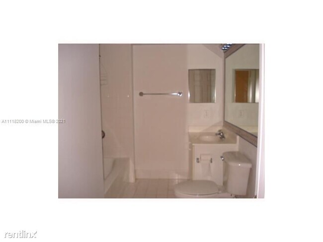 Building Photo - 1 br, 1 bath Condo - 9640 NW 2nd St