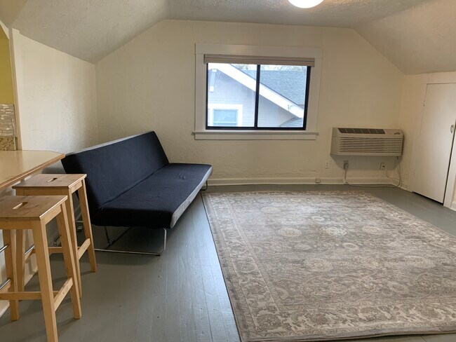 Living room (futon not included but area rug stays) - 4338 NE Glisan St