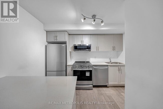 Building Photo - 1115 Douglas McCurdy Cmn