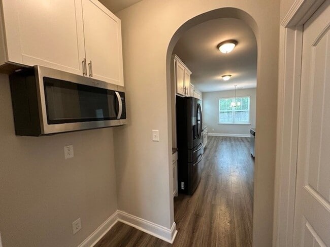 Building Photo - Spacious 4-Bedroom Home with Designer Fini...