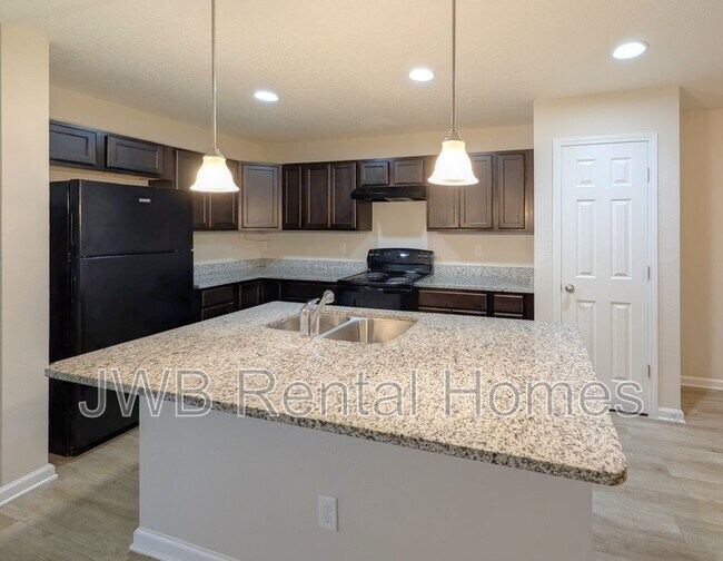 Building Photo - 8216 Eaton Ave