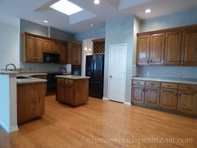 kitchen with skylights - 2402 Crockett Ct