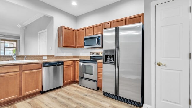 Building Photo - Spacious, light, bright 2 Master BR, 2-car...